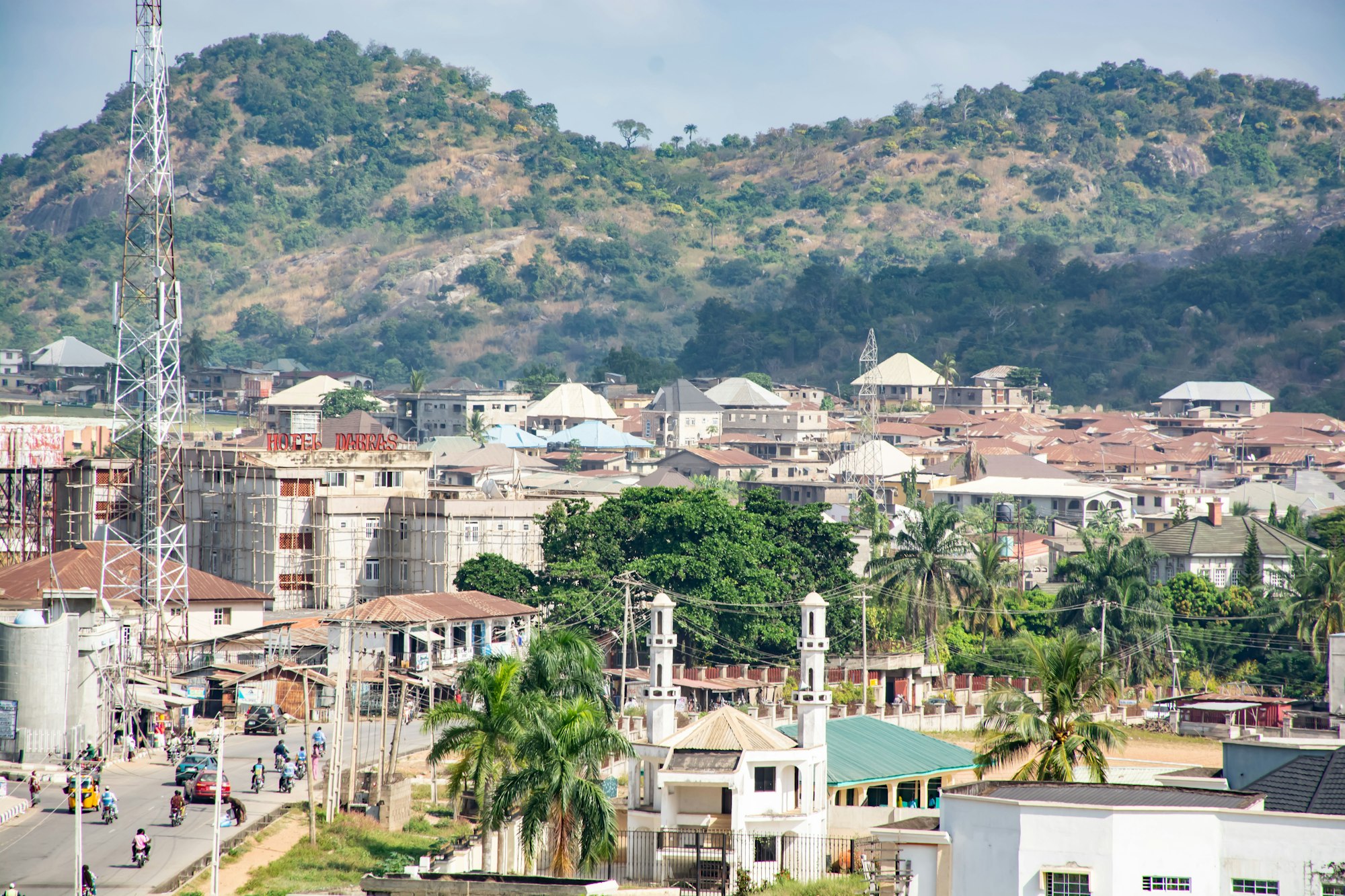 Nigerian town spreading at the foot of a rocky hill